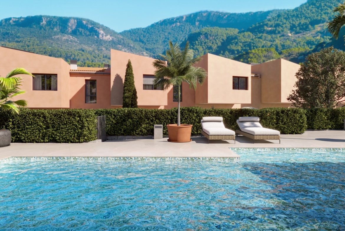 Basen osiedlowy i domy szeregowe ES Voltor z widokiem na góry w Esporles.