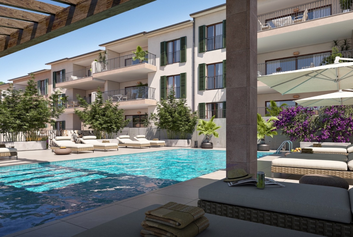 Basen w inwestycji Oli od Taylor Wimpey w Capdepera – leżaki i zieleń