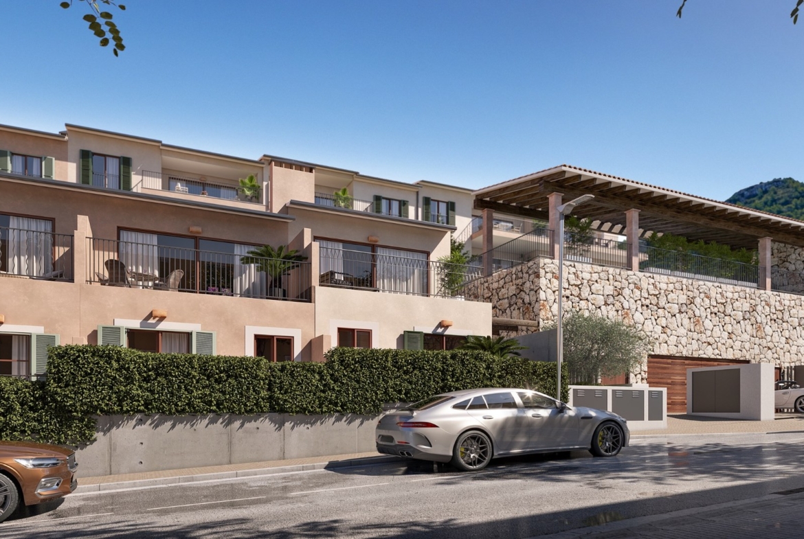 Oli od Taylor Wimpey w Capdepera – elewacja i kamienna strefa rekreacyjna