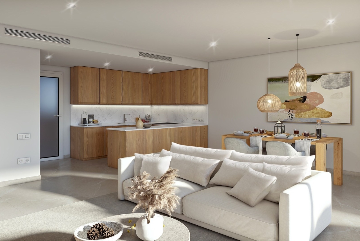 Nowoczesna kuchnia i jadalnia w inwestycji Oli, Capdepera – naturalne materiały i dużo światła.