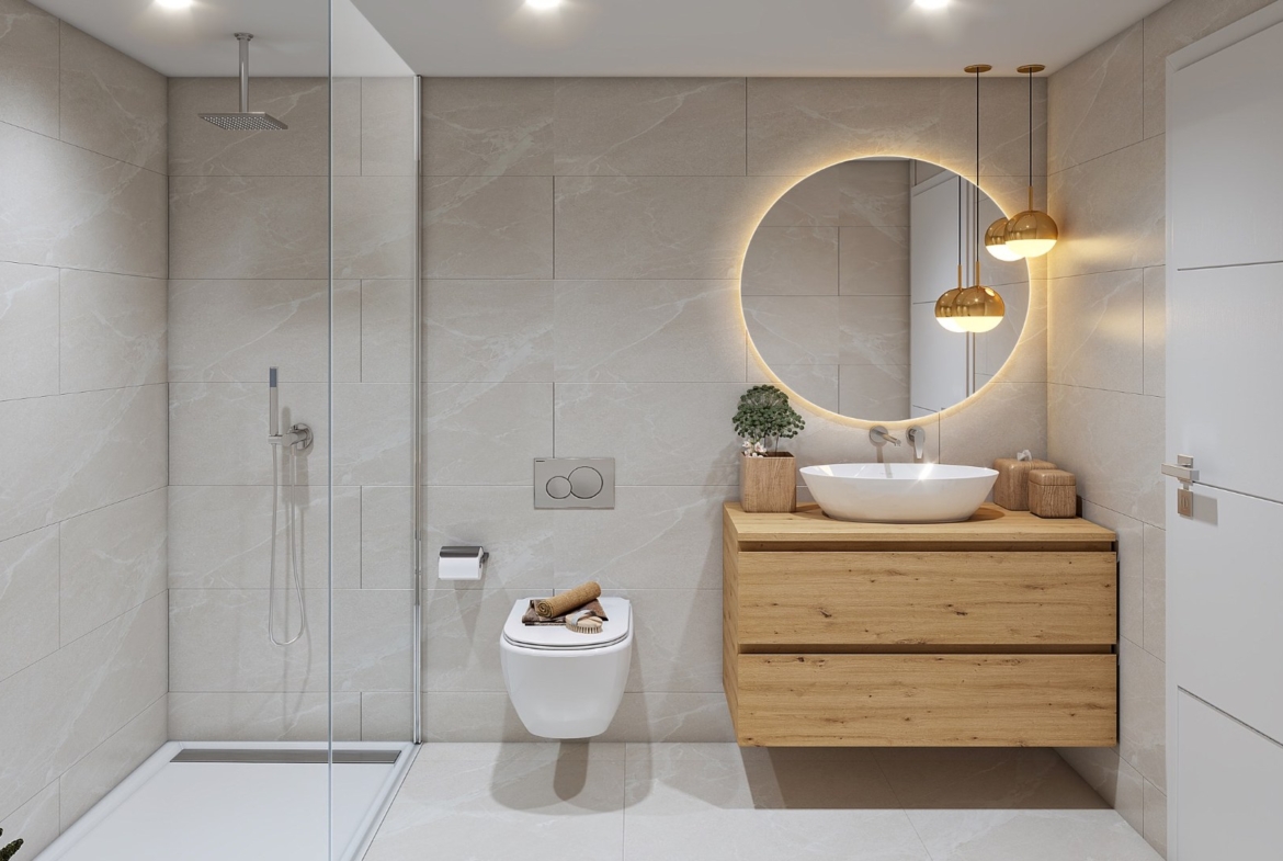 Łazienka w inwestycji Oli, Taylor Wimpey – prysznic typu walk-in i podświetlane lustro.